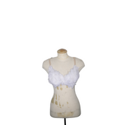 White feather bra on a mannequin against a white background