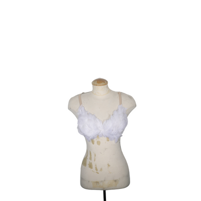 White feather bra on a mannequin against a white background
