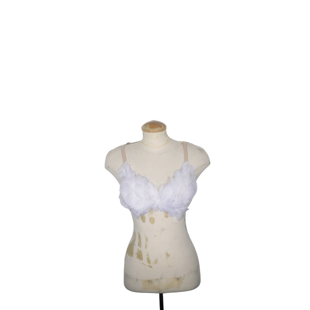 White feather bra on a mannequin against a white background